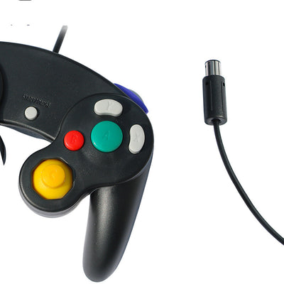 Orange wired gamepad with a USB connector, featuring a D-pad, joystick, and colored action buttons. - Image 2