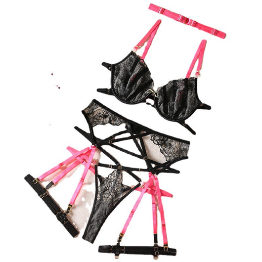 Black lace bra and thong set with hot pink harness straps, gold-tone rings, and a matching hot pink choker. - Image 27