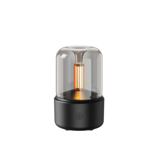 White cylindrical aroma diffuser with a clear top and an amber candlelight-effect LED light. - Image 7