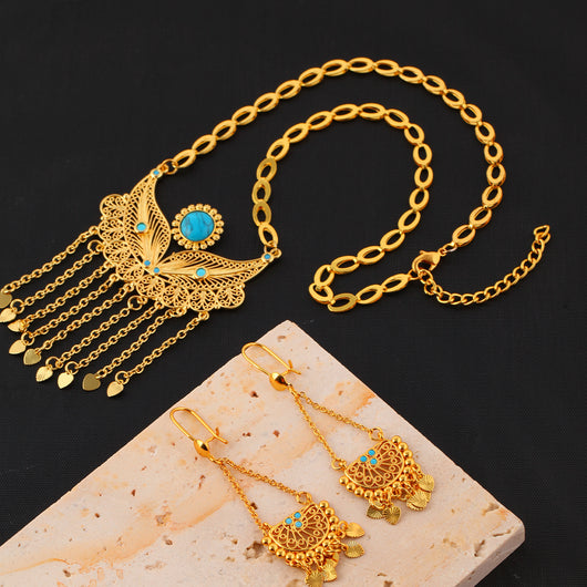 Gold-toned necklace and dangle earrings set with filigree water droplet design, turquoise accents, and tassel charms. - Image 6