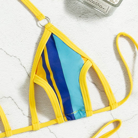 Women's blue and yellow striped two-piece swimsuit with a halter neck bikini top and strappy hollow-style bottoms. - Image 3