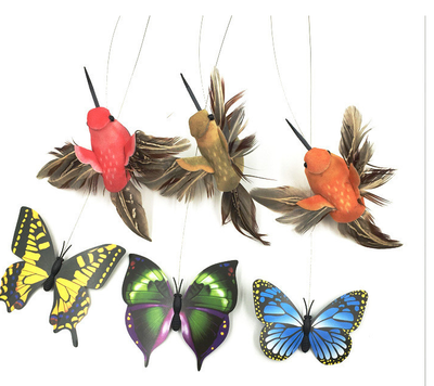 Electric pet toy with a row of white and yellow daisy flowers, green leaves, and five colorful feather birds on wires. - Image 19