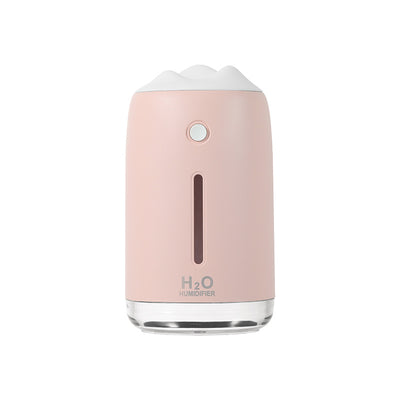 Dark night green mini humidifier with a white mountain-shaped top, clear base, and visible water level indicator. - Image 2