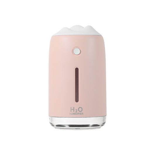 Dark night green mini humidifier with a white mountain-shaped top, clear base, and visible water level indicator. - Image 2