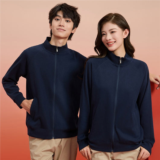 Purple full-zip jacket with a stand-up collar, raglan sleeves, and front pockets, displayed on a hanger.