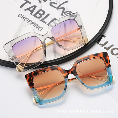 Women's black square frame sunglasses with blue gradient lenses and gold metal temples featuring a pearl accent. - Image 11