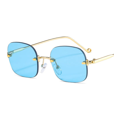 Frameless square sunglasses featuring vibrant blue lenses and sleek gold-colored metal temples and bridge. - Image 18