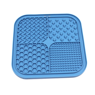 Gray silicone pet licking pad with four textured sections, designed for slow feeding and anti-choking. - Image 41