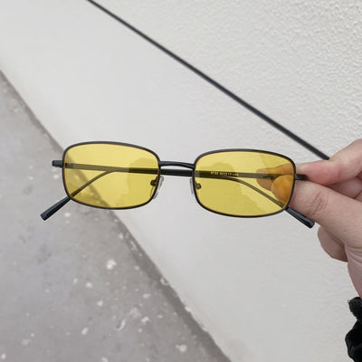 Retro gold metal frame sunglasses with light brown rectangular lenses, displayed on a white surface. - Image 9