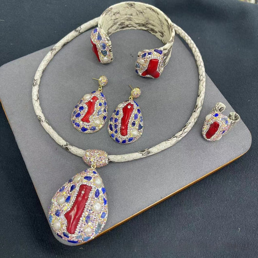 Four-piece jewelry set with white snakeskin leather, red coral-like inlays, pearls, and gemstones. - Image 7