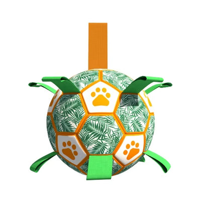 Interactive pet football toy with green palm leaves, orange paw prints, grab tabs, and a ball pump. - Image 14
