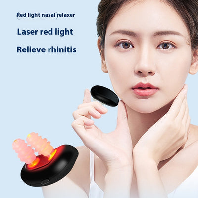 Black intelligent infrared nasal relief device with two translucent nasal probes, shown at an angle.