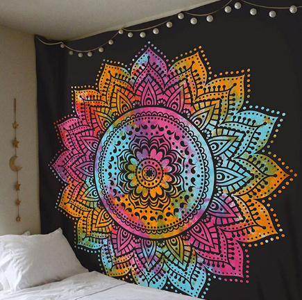 Black and white mandala tapestry with intricate geometric patterns hanging above a bed in a bedroom. - Image 2