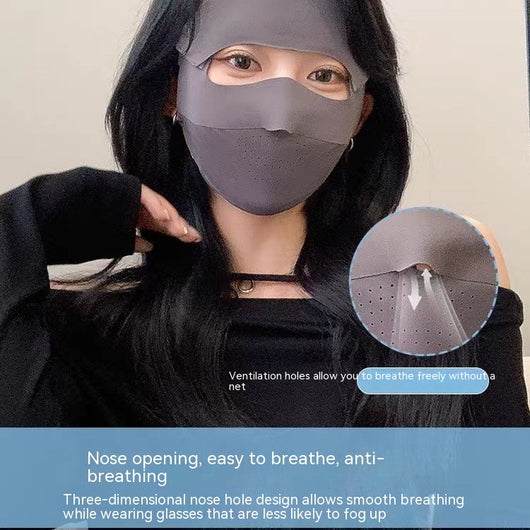 Light blue ice silk face mask with breathable perforations and adjustable ear loops for sun protection. - Image 3