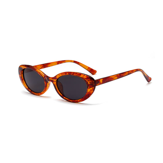 Translucent blue small frame oval sunglasses with light blue lenses on a white background. - Image 2