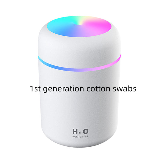 Pink ultrasonic aromatherapy essential oil diffuser with a colorful LED light band and top light, labeled H2O Humidifier. - Image 12
