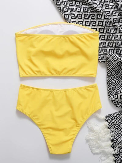 Vibrant orange strapless bandeau bikini top and high-waisted bottoms set, worn by a woman with a white shirt. - Image 19