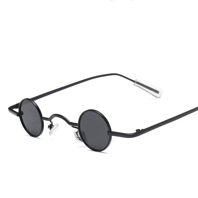 Small frame retro round sunglasses with black metal frames and brown polarized lenses, angled on a white background. - Image 9