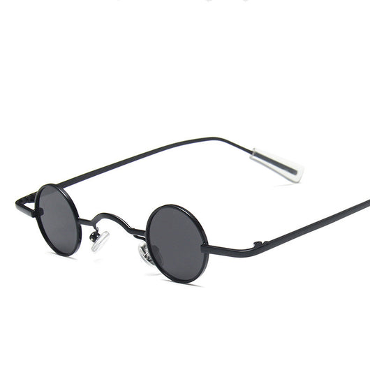 Small frame retro round sunglasses with black metal frames and brown polarized lenses, angled on a white background. - Image 9