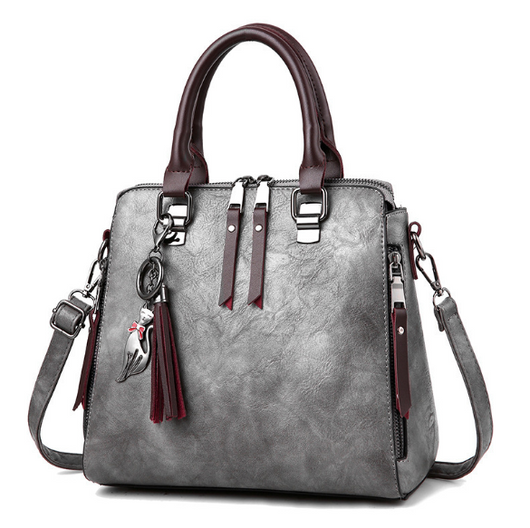 Bolso Elegante de Cuero con Dije de Gato y Borla - Image 7