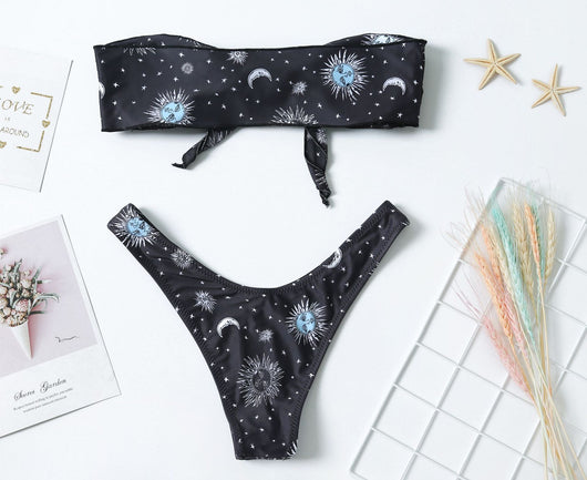 Black celestial print bikini set with a bandeau tie-front top and high-cut bottoms, featuring sun, moon, and star patterns. - Image 20