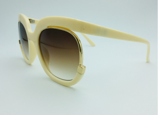 Black cat-eye half-frame sunglasses with gold accents and purple-grey gradient lenses, shown from front and side. - Image 4