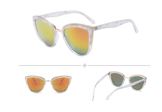 Female cat-eye sunglasses with clear marbled plastic frames, pink mirrored lenses, and gold-tone accents. - Image 6