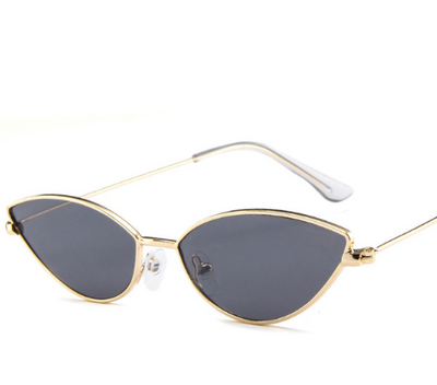 Retro cat eye sunglasses for women with bright yellow lenses and a sleek silver-tone metal frame. - Image 11