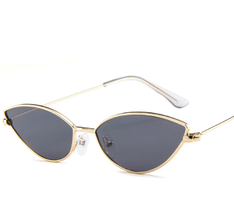 Retro cat eye sunglasses for women with bright yellow lenses and a sleek silver-tone metal frame. - Image 11