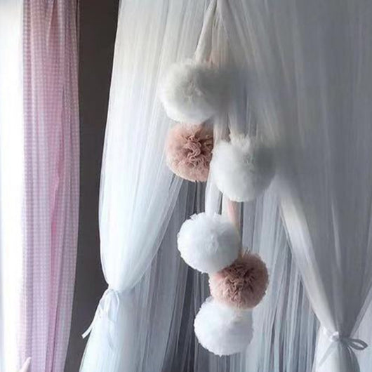 Pink, white, and purple yarn ball pendant party decoration with a fabric tie, ideal for children's rooms. - Image 3
