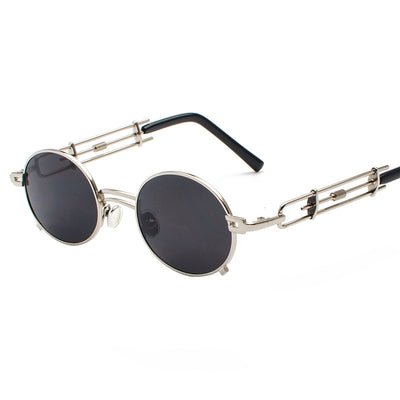 Black individual steampunk sunglasses with round clear lenses and unique metal frames on a white background. - Image 13