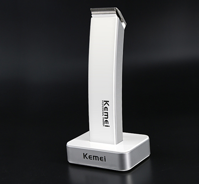 White and silver Kemei Professional Trimmer electric hair clipper with charging base. - Image 5