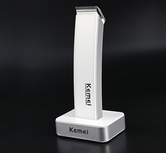 White and silver Kemei Professional Trimmer electric hair clipper with charging base. - Image 5