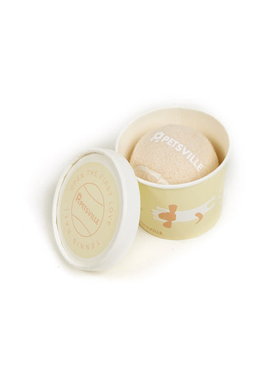 Beige Petsville tennis ball for dogs in a light yellow cylindrical container with a playful dog illustration. - Image 17