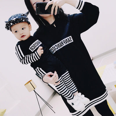 Black sweater suit with white stripes on sleeves and hem, featuring mirrored "SAN FRANCISCO" text on the chest. - Image 4
