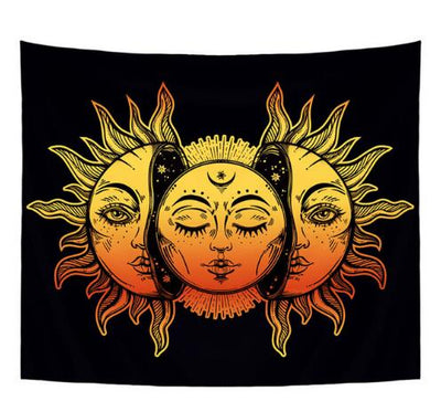 Black tapestry with a vibrant yellow, orange, and red sun and moon celestial print design.