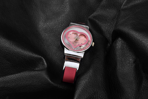 Reloj de pulsera para mujer con diseño de corazón y movimiento de cuarzo