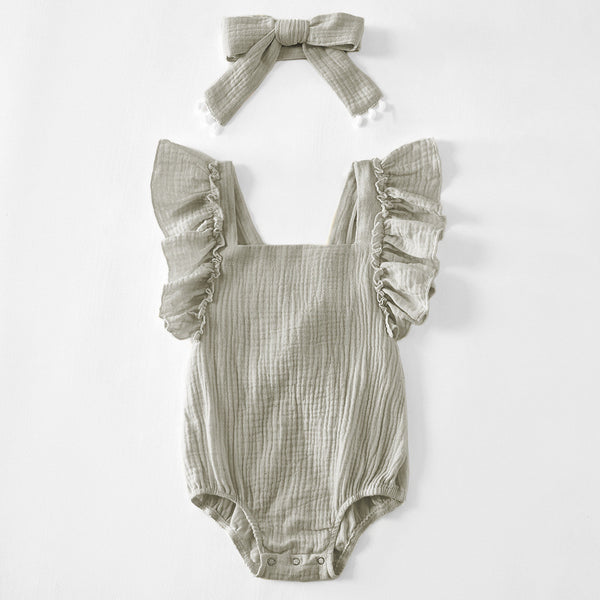 Bata para bebé con volantes en colores sólidos