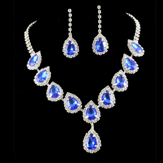 Bridal jewelry set with a silver-tone necklace and matching drop earrings, featuring orange teardrop rhinestones.