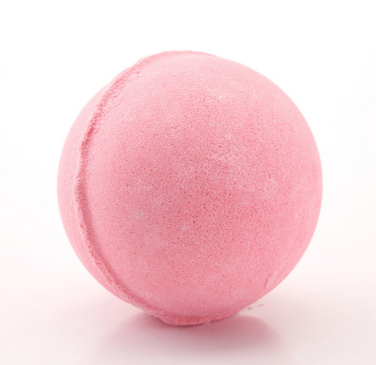 A single, round, light green bath bomb with a slightly textured surface, ready for a relaxing bath. - Image 10