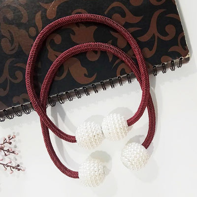 Magenta elastic curtain tieback with two white pearl-beaded spheres, designed to hold curtains elegantly. - Image 8