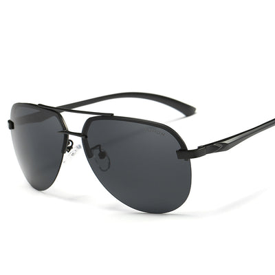 Rimless aviator sunglasses with orange mirrored polarized lenses and silver-toned metal temples on a white background.