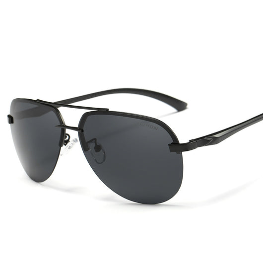Rimless aviator sunglasses with orange mirrored polarized lenses and silver-toned metal temples on a white background.