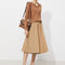 Falda Plisada A-Line Midi con Detalles de Contraste