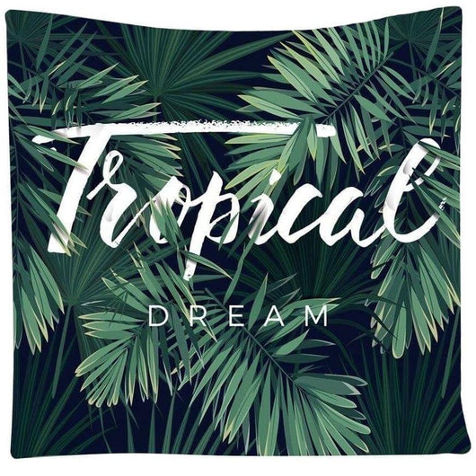 Tropical Dream tapestry with green banana leaves on a dark blue background, hanging on a white brick wall. - Image 2