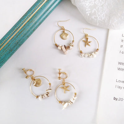 Aretes Estrella de Cinco Puntas en Metal Salvaje con Concha Marina - Image 3