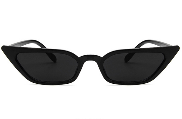 Narrow cat-eye sunglasses with a transparent yellow frame and yellow tinted lenses on a white background. - Image 4