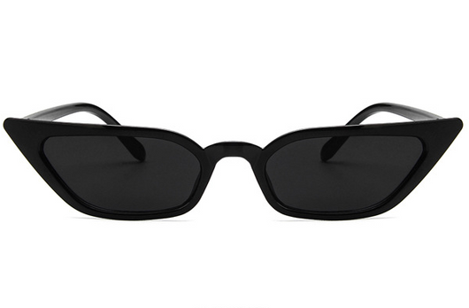 Narrow cat-eye sunglasses with a transparent yellow frame and yellow tinted lenses on a white background. - Image 4