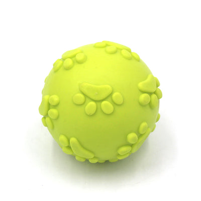 Bright pink TPR dog toy ball with raised paw print and oval patterns, designed for chewing and play. - Image 9