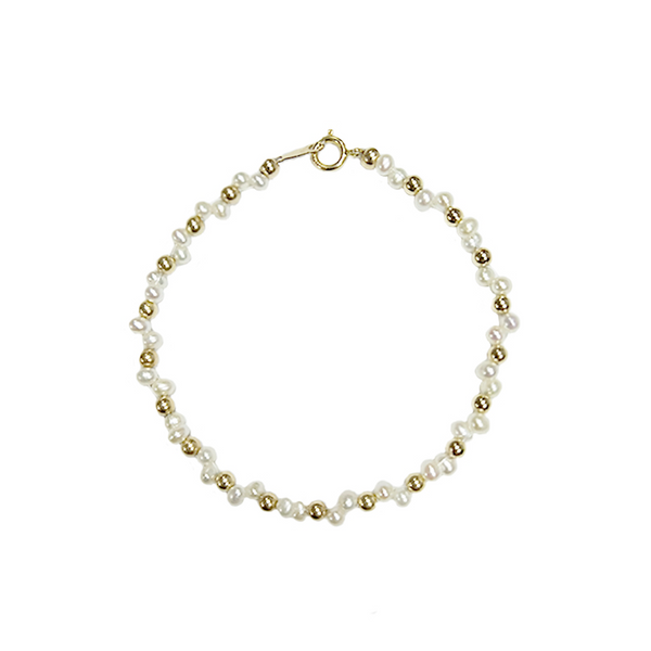 Pulsera Dorada con Bolsita Tejida de Perlas Naturales y Diseño Estelar
